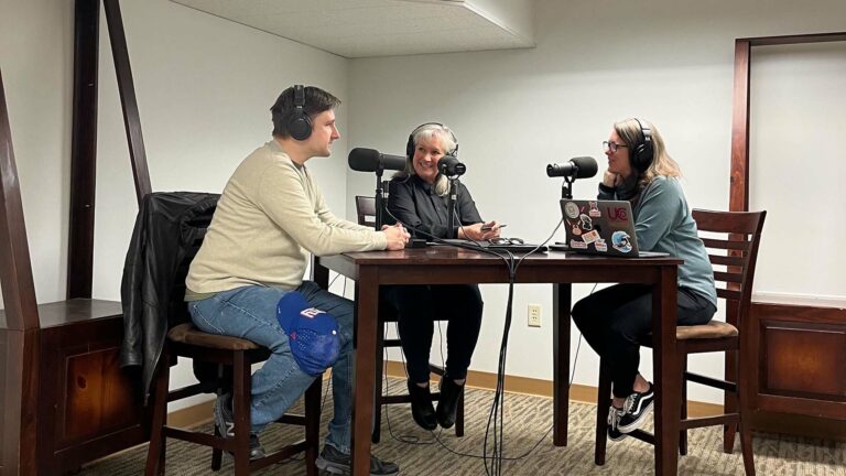 In the studio: Dr. Jennifer Murphy and Not-a-Doctor Rob Merritt, cohosts of Iowa Innovation podcast powered by NewBoCo, chuckle with episode 2 guest, nationally-recognized speaker, and lifelong entrepreneurship advocate Mo Collins