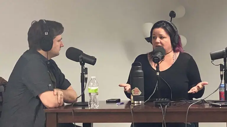 In the studio: Rina Jensen, founder of You Academy, holds her palms upward as she explains a point to Not-A-Doctor Rob Merritt.