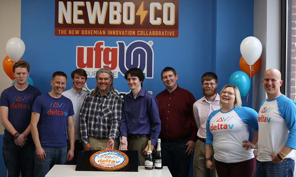 DeltaV 2018 students graduates graduation WEB A DeltaV cohort and their instructors celebrate their successful completion of the program by posing with balloons and a cake
